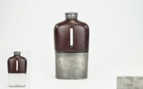 A Mid 20th Century Gentleman's Large Pewter and Leather Clad Spirit Flask In Overall Good Condition