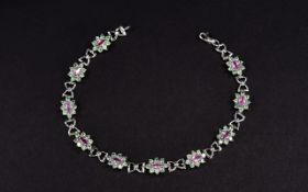 9ct White Gold Bracelet, Each Link Set With Pink & Green Faceted Stones In A Flower Head Setting,