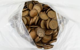 A Bag Containing Over 600 British Half Pennies / Penny's.