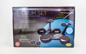 Boxed Electronic Drum Set Six touch sensitive pads with 10 sound settings, headphones output,