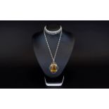 Silver And Tigers Eye Pendant Long fancy silver chain with large oval pendant set in silver