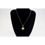 Diamond Cluster Pendant, a square of 16