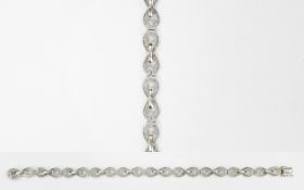 A 9ct White Gold Set Diamond Bracelet wi