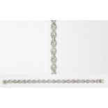 A 9ct White Gold Set Diamond Bracelet wi