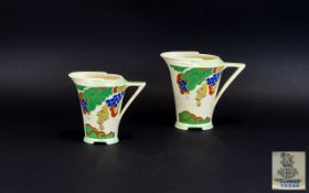 Royal Doulton - Hand Painted Art Deco Conical Shaped Handle Pair of Jugs, In The ' Caprice ' Design.