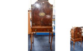 Mid 20thC Flamed Mahogany Drinks/Cocktail Cabinet Raised On Long Cabriole Legs With Carved Shell