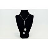 Swarovski Silver Tone And Crystal Lariat Style Necklace Long necklace with two circular crystal set