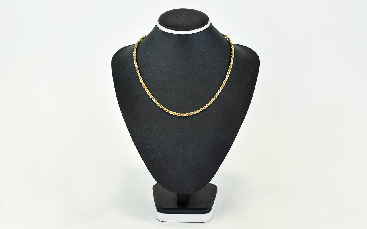 A 9ct Gold Rope Twist Chain. Fully Hallmarked. As New Condition. 14.5 grams. 15.5 Inches In length.
