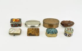 A Collection of 19th & 20th Century Pill and Snuff Boxes, Including a Carved Coquilla Nut Snuff