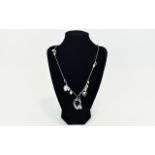 Swarovski Statement Necklace Long necklace on silver tone fine chain with 10 faceted crystals in