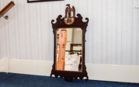 Empire Style Mahogany Framed Mirror, gilt eagle finial with scroll top and bottom.