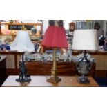 A Collection Of Table Lamps Three contemporary reproduction lamps, to include one with resin base in