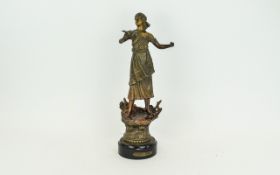 Bronzed Figure of a Classical Dressed Girl with an outstretched hand holding a flower.