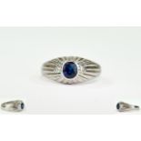 14ct White Gold Set Single Stone Sapphire and Diamond Ring.