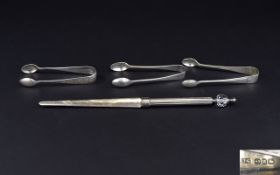 A Collection Of Plated Items to include three pairs of sugar nips and plated letter opener with