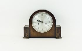 Vintage Mantle Clock Dark Wood Cased Art Deco mantle clock with brushed silver tone metal face and
