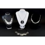 A Collection Of Contemporary Silver Tone Statement Necklaces Boxed collection stone and crystal set