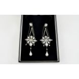 A 1920's Attractive and Well Designed Pair of Paste Set Drop Earrings From The Art Deco Period.