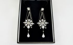 A 1920's Attractive and Well Designed Pair of Paste Set Drop Earrings From The Art Deco Period.