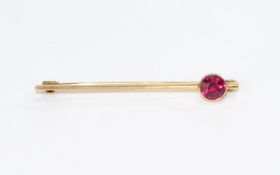 Antique Gold Brooch Set with Large Faceted Ruby. Not Marked but Tests Gold. 4.5 grams.