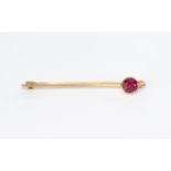 Antique Gold Brooch Set with Large Faceted Ruby. Not Marked but Tests Gold. 4.5 grams.