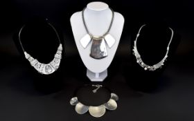 A Collection Of Contemporary Silver Tone Statement Necklaces Boxed collection stone and crystal set