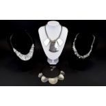 A Collection Of Contemporary Silver Tone Statement Necklaces Boxed collection stone and crystal set