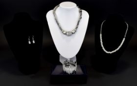 A Collection Of Crystal Set Costume Jewellery Four items in total to include crystal elasticated