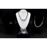 A Collection Of Crystal Set Costume Jewellery Four items in total to include crystal elasticated