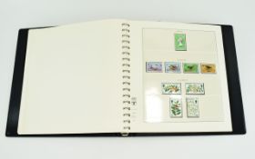 Guernsey Stamp Album Christmas 1969 to Christmas 1985 all mint and mounted.