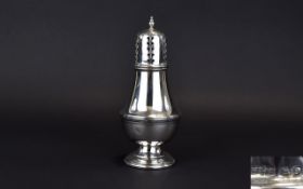 Edwardian Silver Sugar Sifter with Flame Finial and Flared Body, Circular Stepped Base.