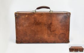 Vintage Leather Suitcase Large, weathered travel case with corner protectors and wood strapping.