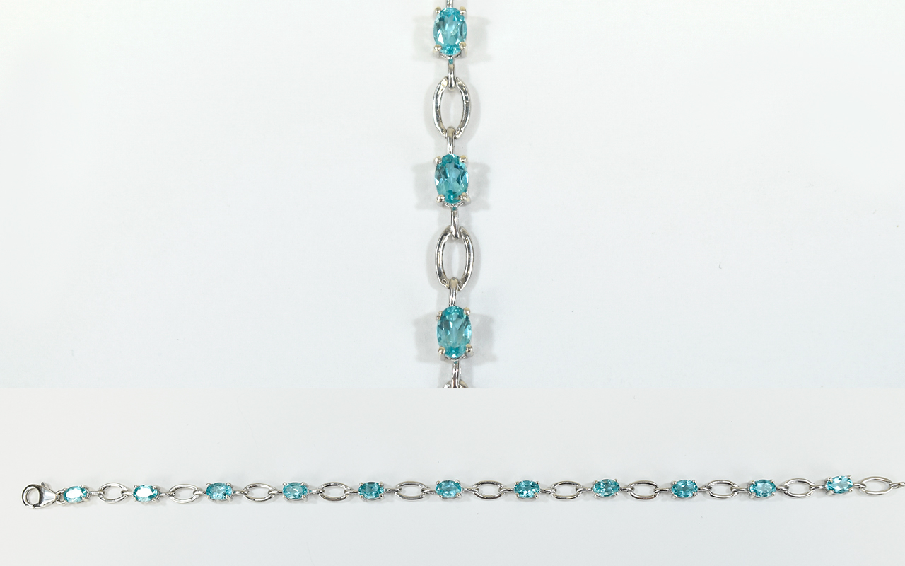 Paraibe Apatite Tennis Bracelet, oval cut solitaires of paraibe apatite,