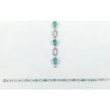 Paraibe Apatite Tennis Bracelet, oval cut solitaires of paraibe apatite,