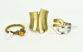 Statement Cuff And Bracelets Three in total to include large gold tone hinged statement cuff with