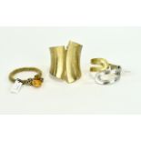 Statement Cuff And Bracelets Three in total to include large gold tone hinged statement cuff with