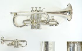 Eterna by Getzen Silver Plated Cornet. Serial Num SK36789. Length 15.25 Inches.