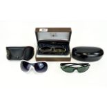 Three Pairs of Sun Glasses with cases. 1. Rayban 2. Gucci and Five Gold Polaroid. All in very good