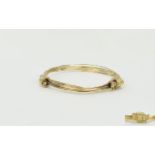 A 9ct Gold Elephant Hair Bracelet / Bangle. Fully Hallmarked for 375 - 9ct Gold. 13.8 grams.