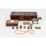 Old Glove Box containing a quantity of assorted items including thimbles, match striker,