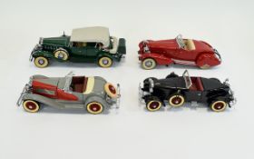 A Collection Of Diecast Model Classic Cars By Danbury Mint.