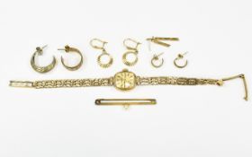 Small Mixed Lot Of 9ct Gold Jewellery Comprising A Bar Brooch, Rotary Wristwatch, Odd Earrings.