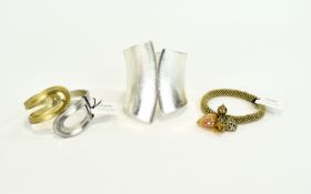 Statement Cuff And Bracelets Three in to