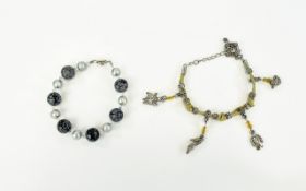 Snowflake Obsidian Bracelet And Japanese Charm Bracelet Small, elasticated, beaded bracelet with