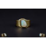 Ladies 9ct Gold and Opal Set Dress Ring the large opal of nice quality and good colour.