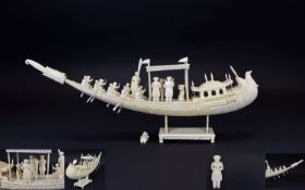 An Indian Ivory Well Carved Model of a Ceremonial Boat with Figures. Late 19th Century with