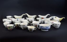 A Mixed Collection Of Ceramic Gravy Boats And Cups approx 36 pieces in total