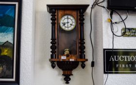 Vienna Wall Clock typical form, spring driven movement with pendulum.