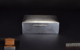 George V Nice Quality Silver Table Cigarette Box with engine turned cover and ornate border.