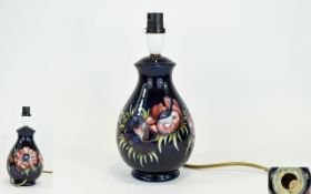 W. Moorcroft Signed Lamp Base ' Anemone ' Design on Blue Ground. Label to Base Reads - Potters to